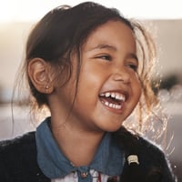 young girl laughing
